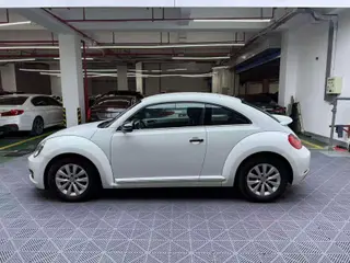 Volkswagen Beetle 2014 1.2TSI Fashionable exterior photo 3 Volkswagen Beetle 2014 1.2TSI Fashionable exterior photo 3