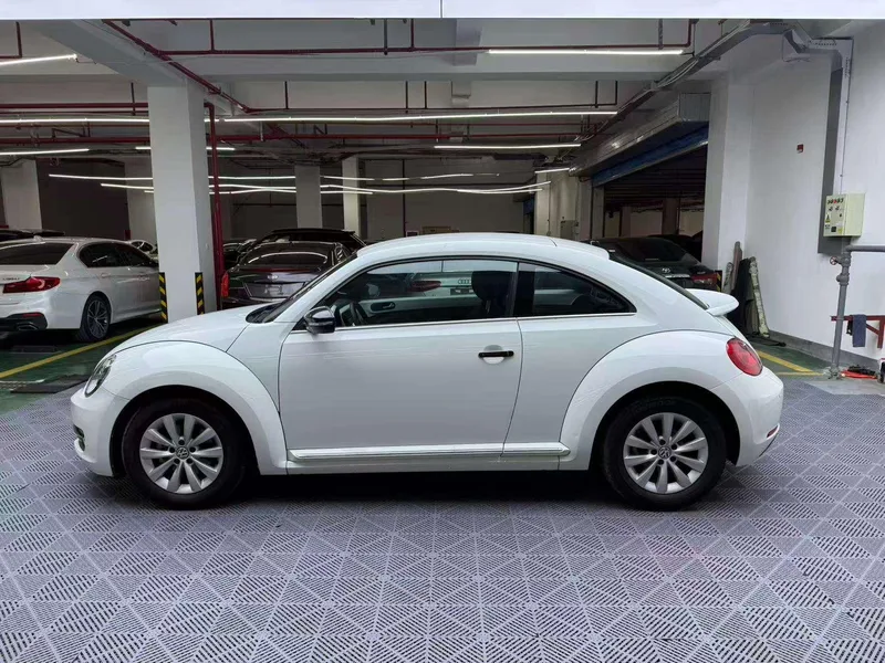Volkswagen Beetle 2014 1.2TSI Fashionable exterior photo 3 Volkswagen Beetle 2014 1.2TSI Fashionable exterior photo 3