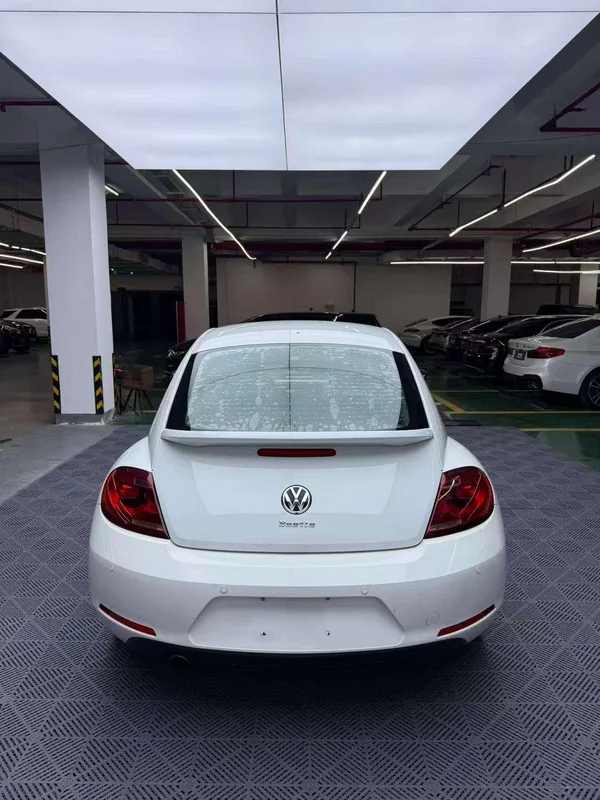 Volkswagen Beetle 2014 1.2TSI Fashionable exterior photo 5 Volkswagen Beetle 2014 1.2TSI Fashionable exterior photo 5