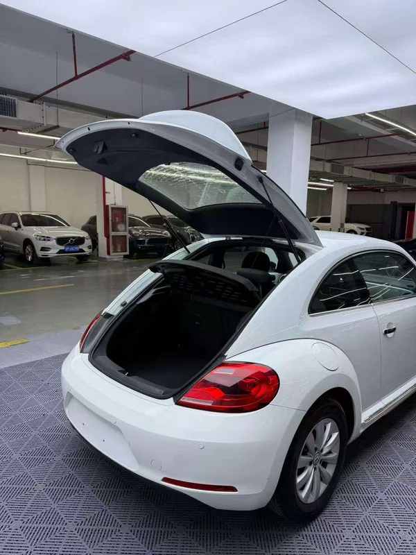 Volkswagen Beetle 2014 1.2TSI Fashionable exterior photo 6 Volkswagen Beetle 2014 1.2TSI Fashionable exterior photo 6