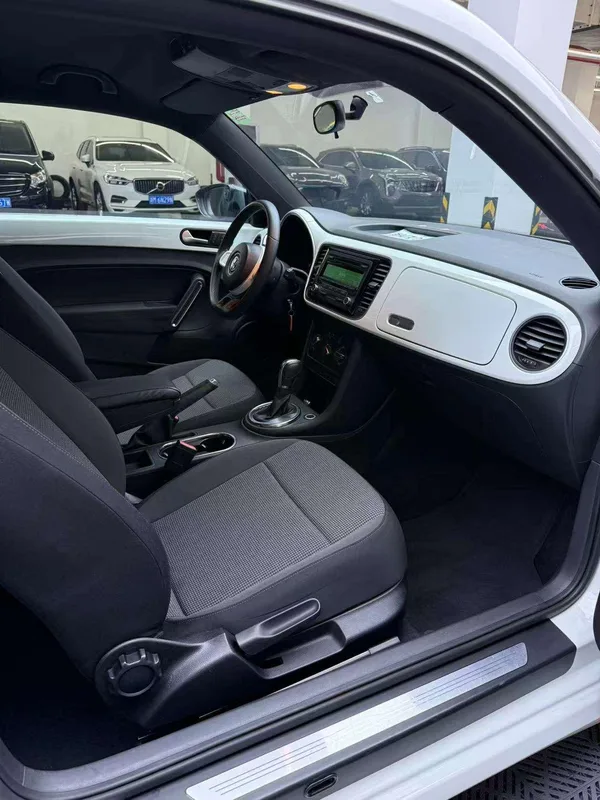 Volkswagen Beetle 2014 1.2TSI Fashionable exterior photo 9 Volkswagen Beetle 2014 1.2TSI Fashionable exterior photo 9
