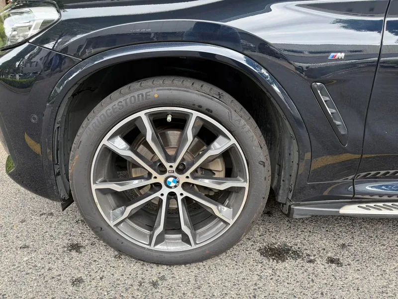 BMW X3 2023 xDrive30i Premium Class M Obsidian Night Suit exterior photo 4