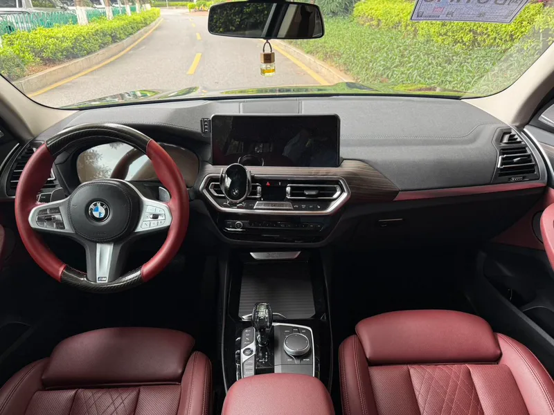 BMW X3 2023 xDrive30i Premium Class M Obsidian Night Suit interior photo 10