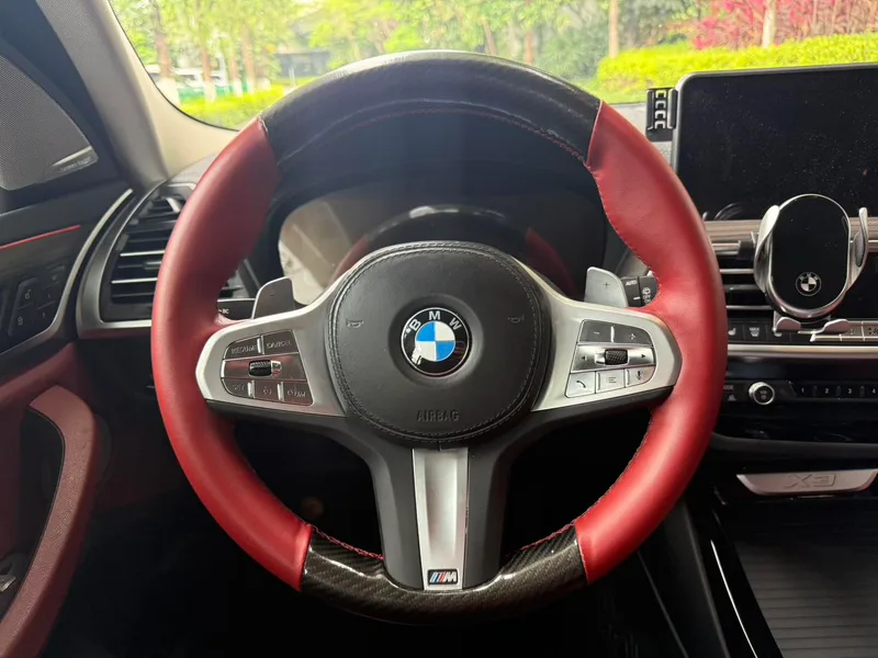 BMW X3 2023 xDrive30i Premium Class M Obsidian Night Suit interior photo 11