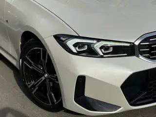 BMW 3 Series 2023 325i M Sports suit exterior photo 3