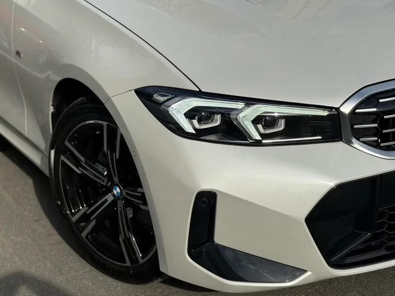 BMW 3 Series 2023 325i M Sports suit exterior photo 3