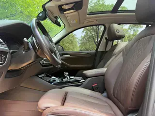 BMW X3 2022 xDrive30i Лидирующий M Ночной костюм интерьер фото 10