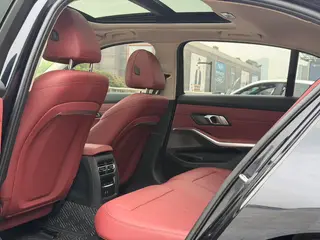 BMW 3 Series 2023 325Li M Спортивный костюм интерьер фото 7