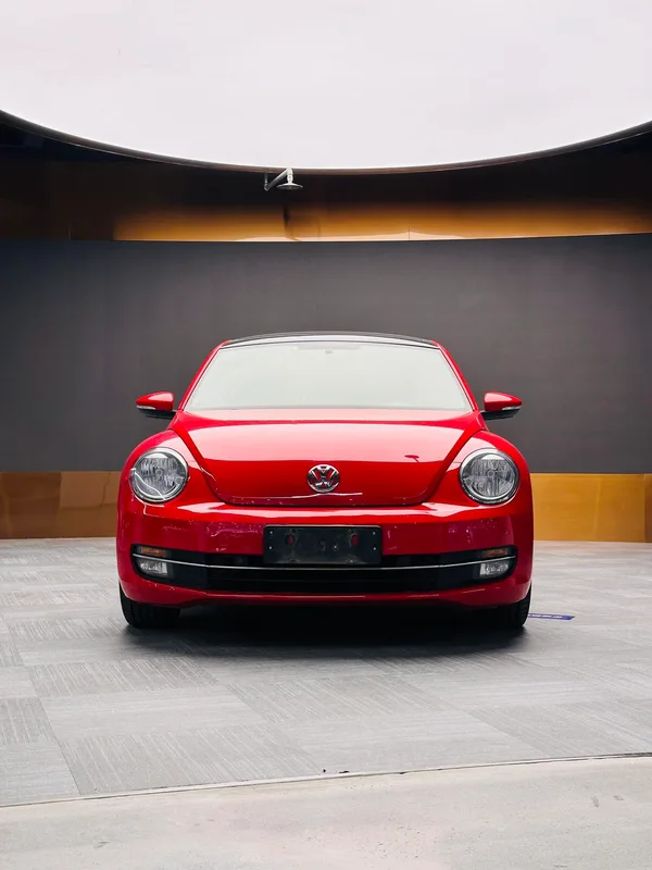 Volkswagen Beetle 2013 1.4TSI Comfortable exterior photo 2 Volkswagen Beetle 2013 1.4TSI Comfortable exterior photo 2