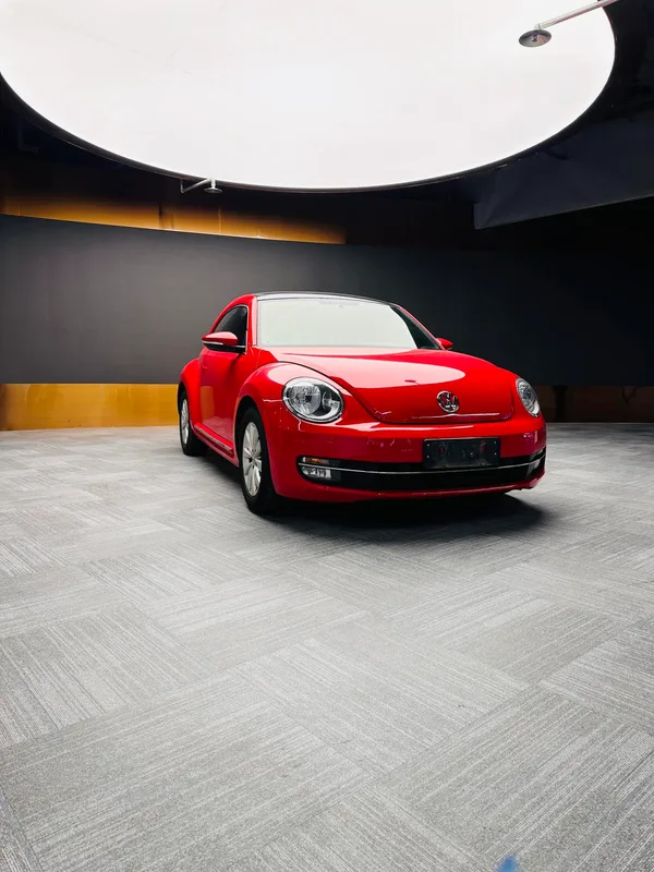 Volkswagen Beetle 2013 1.4TSI Comfortable exterior photo 4 Volkswagen Beetle 2013 1.4TSI Comfortable exterior photo 4