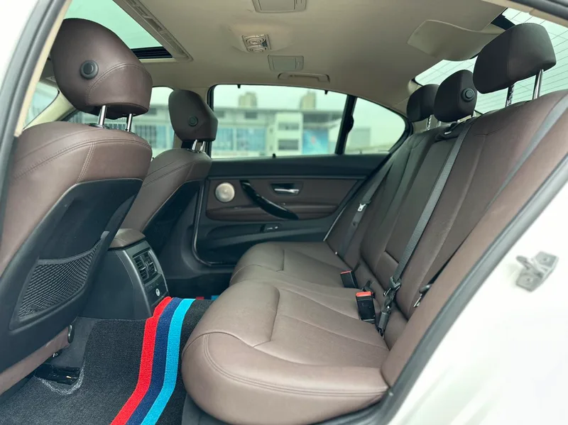 BMW 3 Series 2019 320Li M Спортивный костюм интерьер фото 13
