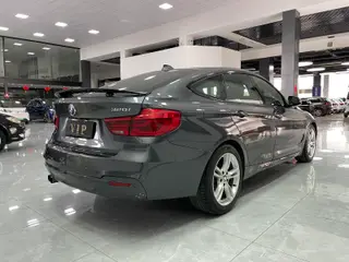BMW 3 Series GT 2019 320i M Спортивный интерьер фото 17
