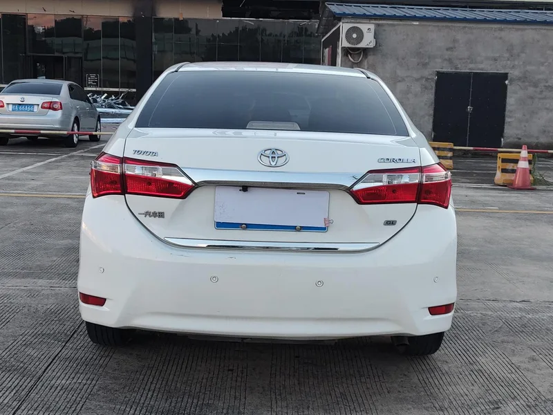 Toyota Corolla 2014 1.6L CVT GL экстерьер фото 5 Toyota Corolla 2014 1.6L CVT GL экстерьер фото 5