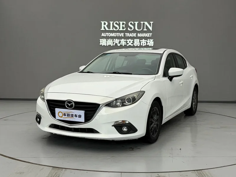 Mazda Mazda3 Axela 2014 Трёхобъёмный 1.5L Автоматическая люксовая модель экстерьер фото 1 Mazda Mazda3 Axela 2014 Трёхобъёмный 1.5L Автоматическая люксовая модель экстерьер фото 1
