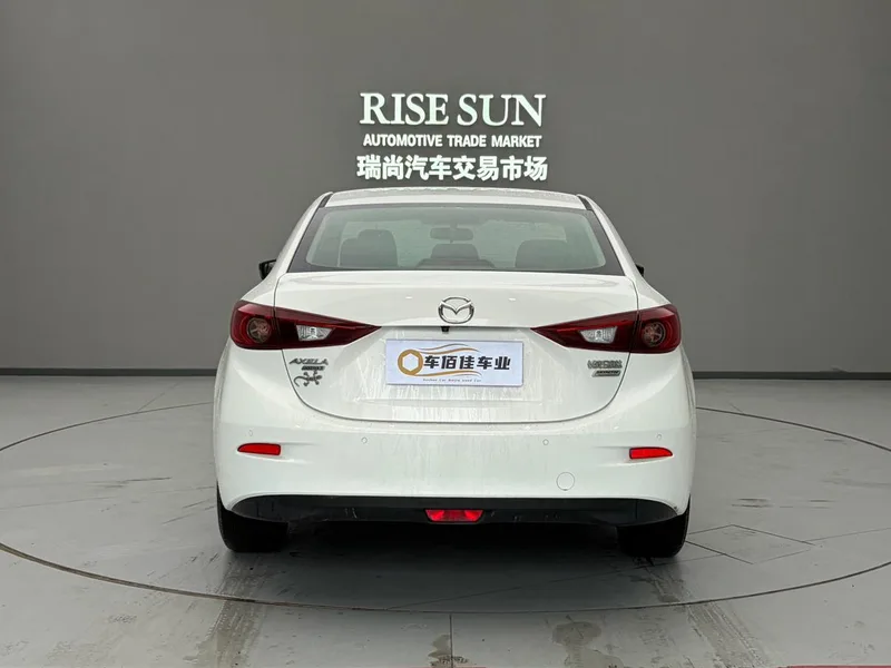 Mazda Mazda3 Axela 2014 Трёхобъёмный 1.5L Автоматическая люксовая модель экстерьер фото 5 Mazda Mazda3 Axela 2014 Трёхобъёмный 1.5L Автоматическая люксовая модель экстерьер фото 5