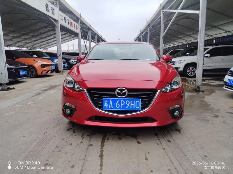 Mazda Mazda3 Axela 2016 Трёхобъёмный 1.5L Автоматическая люксовая модель экстерьер фото 2 Mazda Mazda3 Axela 2016 Трёхобъёмный 1.5L Автоматическая люксовая модель экстерьер фото 2