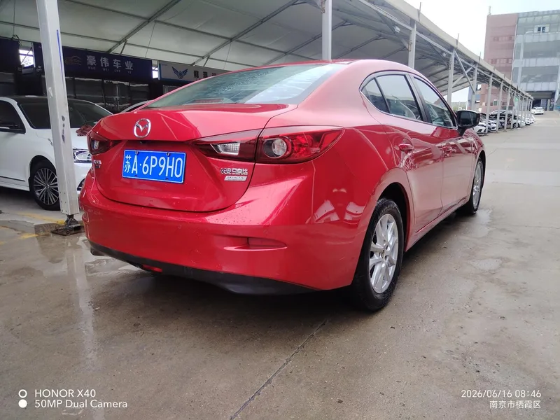 Mazda Mazda3 Axela 2016 Трёхобъёмный 1.5L Автоматическая люксовая модель экстерьер фото 4 Mazda Mazda3 Axela 2016 Трёхобъёмный 1.5L Автоматическая люксовая модель экстерьер фото 4