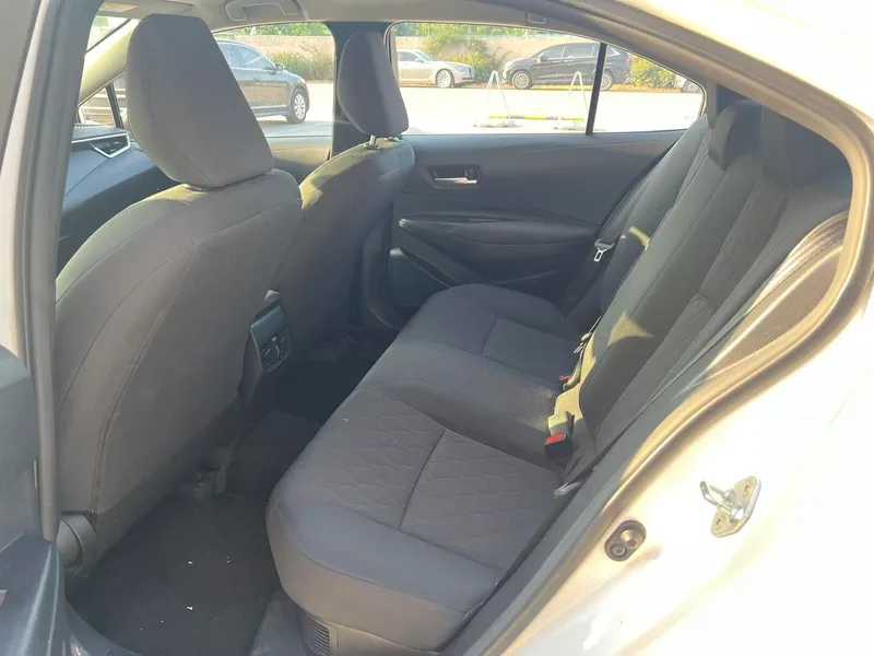 Toyota Corolla 2023 Motor doble híbrido eléctrico inteligente 1.8L E-CVT Versión pionera interior foto 6 Toyota Corolla 2023 Motor doble híbrido eléctrico inteligente 1.8L E-CVT Versión pionera interior foto 6