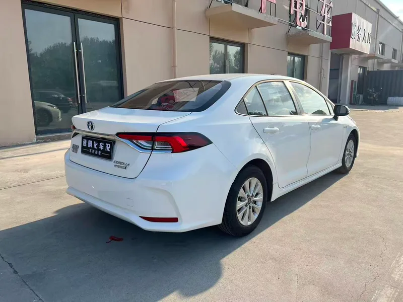 Toyota Corolla 2023 Motor doble híbrido eléctrico inteligente 1.8L E-CVT Versión pionera interior foto 9 Toyota Corolla 2023 Motor doble híbrido eléctrico inteligente 1.8L E-CVT Versión pionera interior foto 9