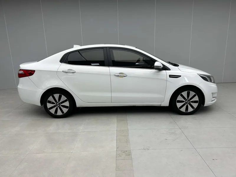 Kia K2 2012 Трёхобъёмный 1.6L AT Premium Памятное издание экстерьер фото 3 Kia K2 2012 Трёхобъёмный 1.6L AT Premium Памятное издание экстерьер фото 3