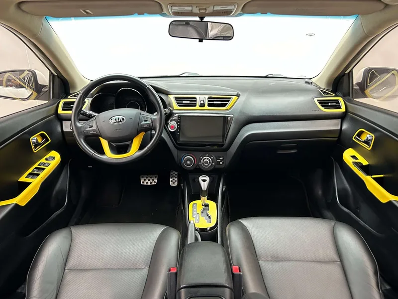 Kia K2 2012 Трёхобъёмный 1.6L AT Premium Памятное издание интерьер фото 9 Kia K2 2012 Трёхобъёмный 1.6L AT Premium Памятное издание интерьер фото 9