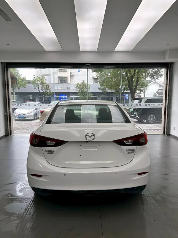 Mazda Mazda3 Axela 2016 Tres volúmenes 1.5L Automático de lujo interior foto 8 Mazda Mazda3 Axela 2016 Tres volúmenes 1.5L Automático de lujo interior foto 8